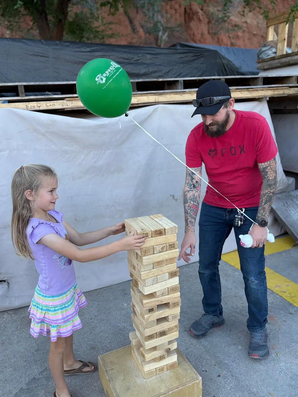 Father and Daughter playing jenga