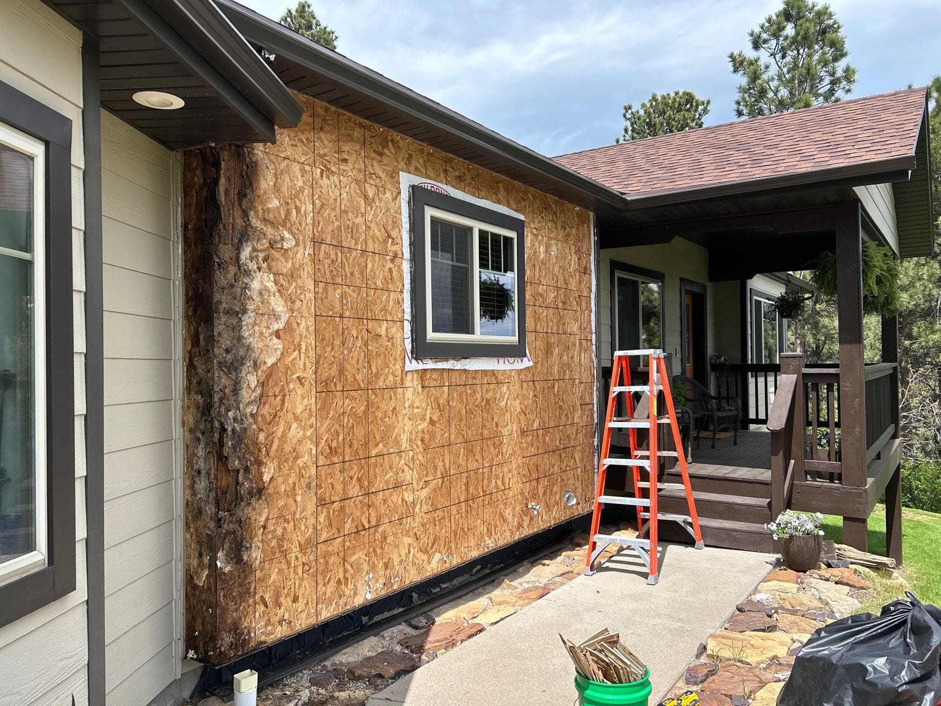 Home in process of repair with new siding