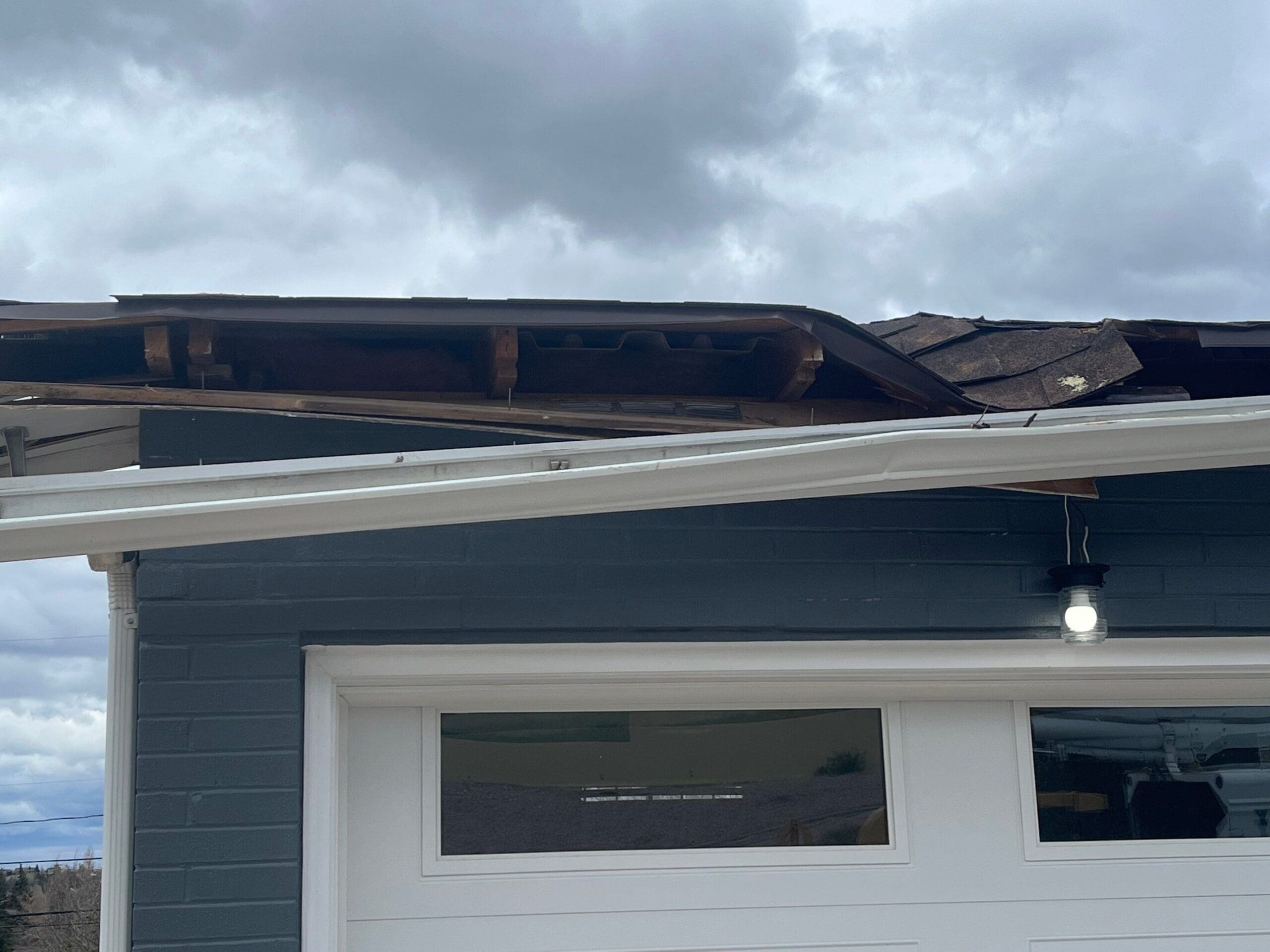 Home with a damaged roof