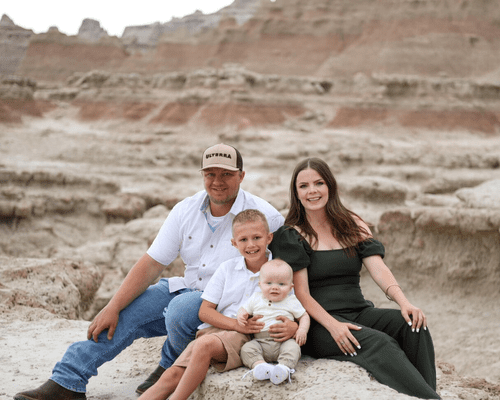 Jessica's smiling family potrait photo in the Badlands