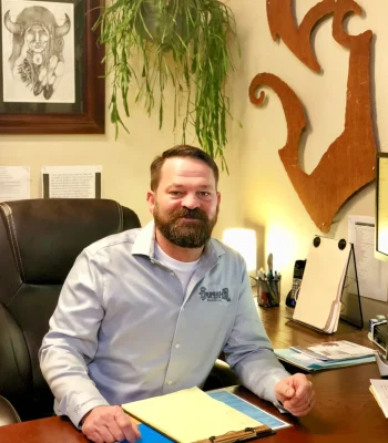 Chad Roth at desk